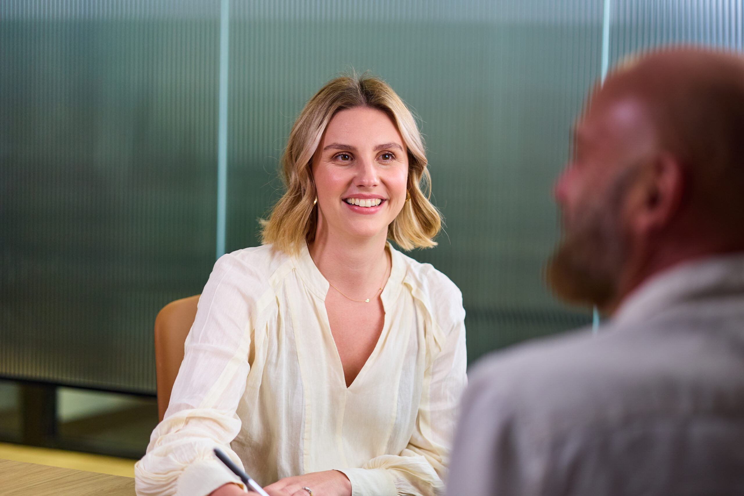 Clients meeting with experienced WorkCover solicitors in a professional Brisbane law office.